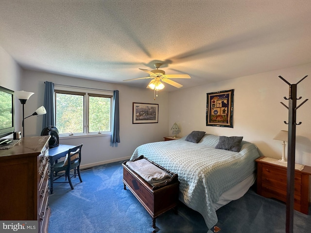 bedroom with ceiling fan, a textured ceiling, baseboards, and carpet flooring