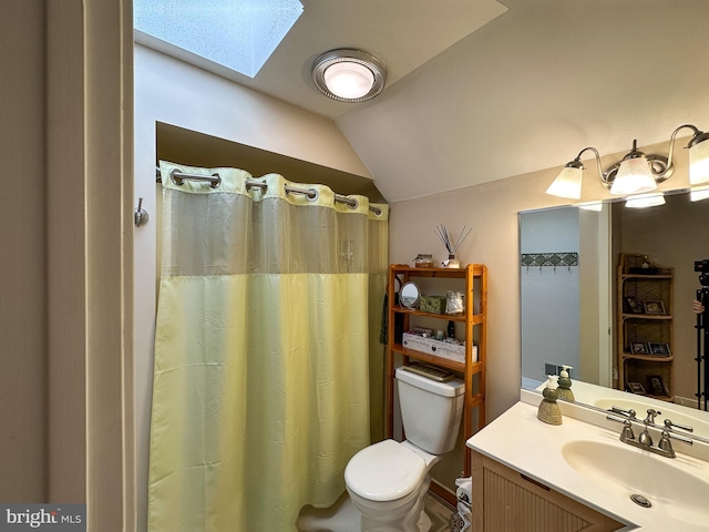 full bath featuring toilet, lofted ceiling with skylight, a shower with shower curtain, and vanity