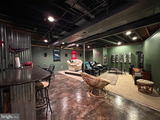 game room featuring finished concrete floors and visible vents