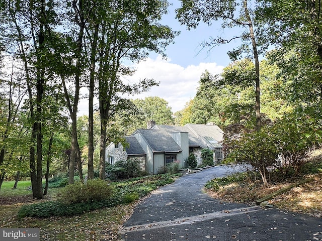 view of front of property with aphalt driveway