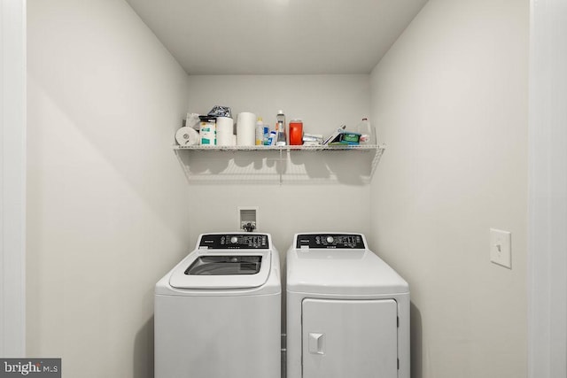 laundry area featuring laundry area and washing machine and clothes dryer