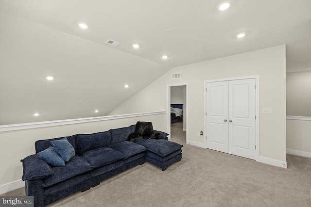 living area with vaulted ceiling, carpet floors, visible vents, and recessed lighting