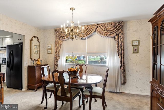 dining area featuring baseboards, light carpet, a chandelier, and wallpapered walls