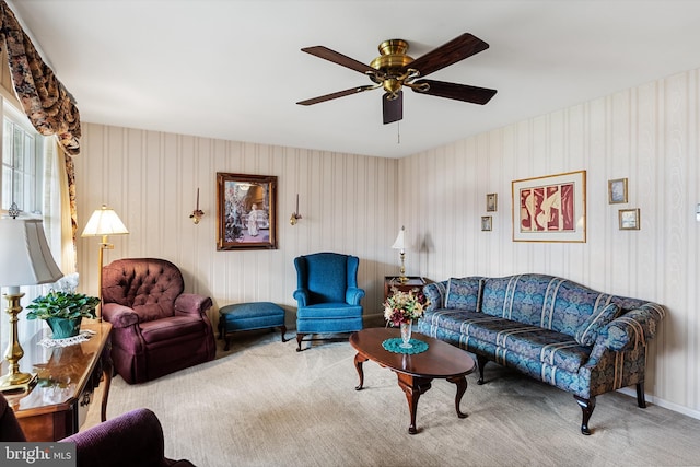 living room with carpet floors and ceiling fan