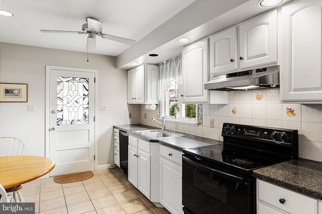 kitchen featuring white cabinetry, black electric range oven, under cabinet range hood, and a sink