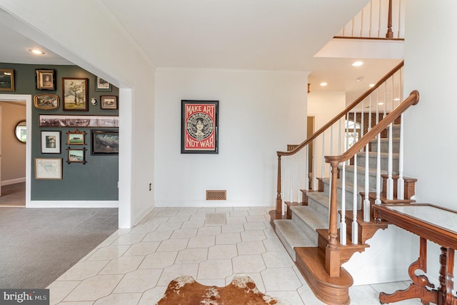 stairs featuring carpet flooring, recessed lighting, crown molding, and baseboards