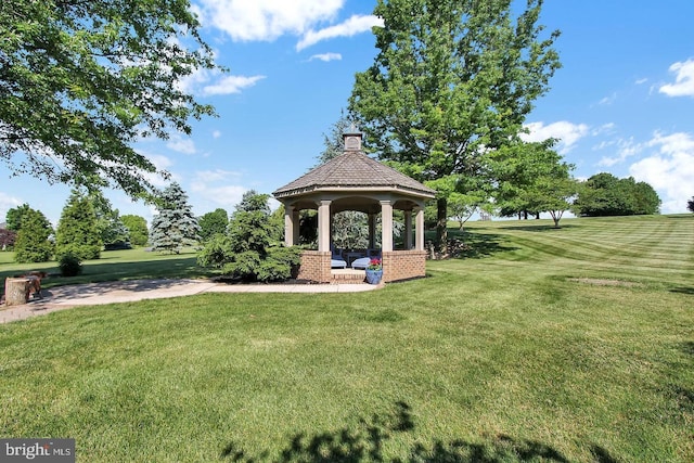 view of home's community featuring a gazebo and a lawn