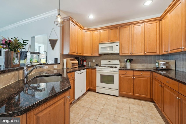 kitchen featuring tasteful backsplash, crown molding, light tile patterned flooring, white appliances, and a sink