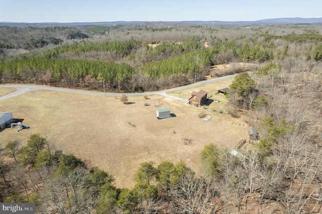 birds eye view of property with a rural view