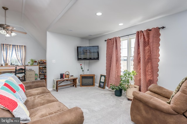 carpeted living room featuring recessed lighting, a ceiling fan, and baseboards