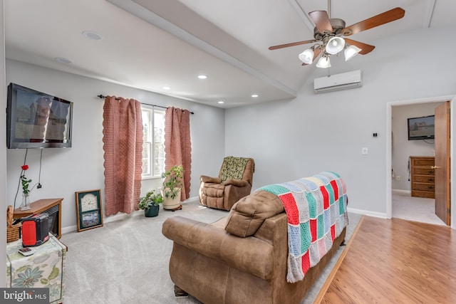 carpeted living area featuring wood finished floors, baseboards, recessed lighting, ceiling fan, and an AC wall unit