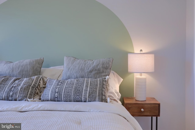 bedroom with vaulted ceiling