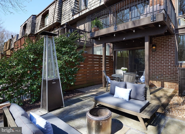 view of patio / terrace with outdoor dining area and an outdoor hangout area