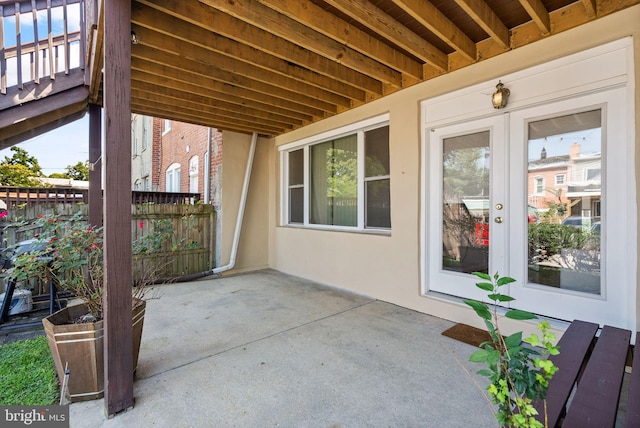 view of patio featuring fence