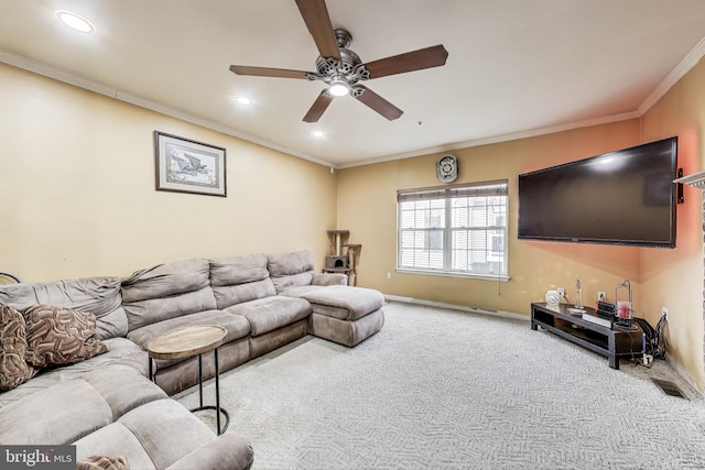 living room with baseboards, carpet floors, a ceiling fan, and crown molding