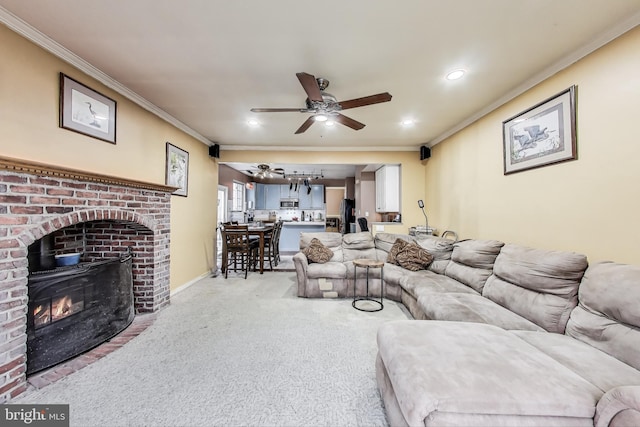 carpeted living room featuring recessed lighting, a ceiling fan, baseboards, and ornamental molding