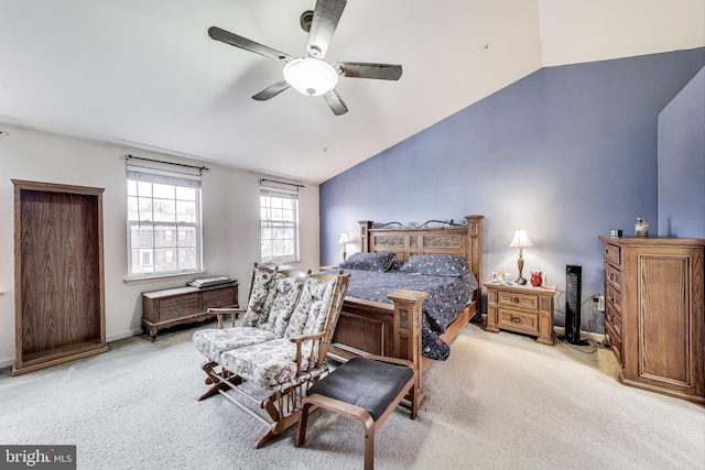 bedroom with baseboards, light carpet, lofted ceiling, and a ceiling fan