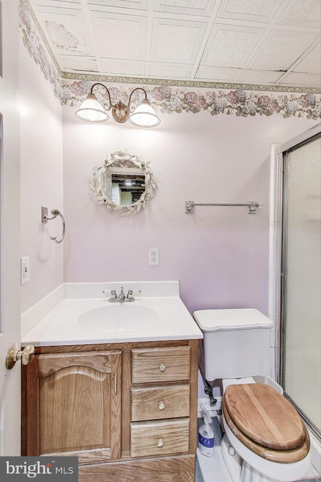bathroom with an enclosed shower, toilet, an ornate ceiling, and vanity