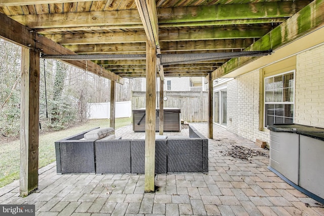 view of patio / terrace featuring fence and an outdoor hangout area