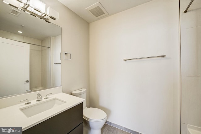 full bath with toilet, walk in shower, vanity, and visible vents