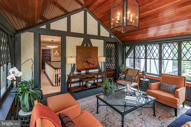 82 Library Pl, Princeton, NJ 08540 - living room featuring wood ceiling, a chandelier, high vaulted ceiling, and tile patterned flooring