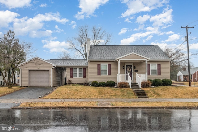 bungalow-style home featuring a chimney, aphalt driveway, roof with shingles, an attached garage, and a front lawn