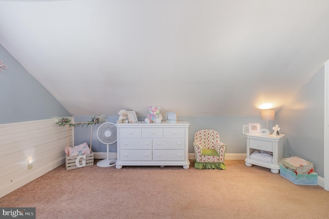 game room with carpet and vaulted ceiling