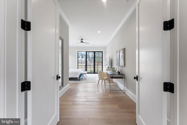 corridor with ornamental molding, recessed lighting, baseboards, and wood finished floors