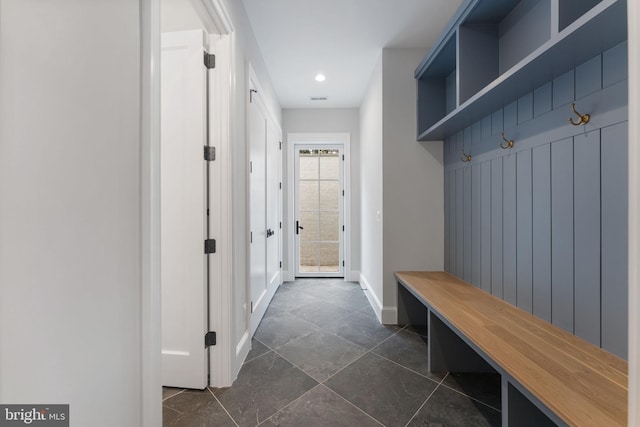 mudroom featuring visible vents and baseboards