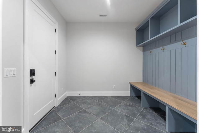 mudroom with visible vents and baseboards