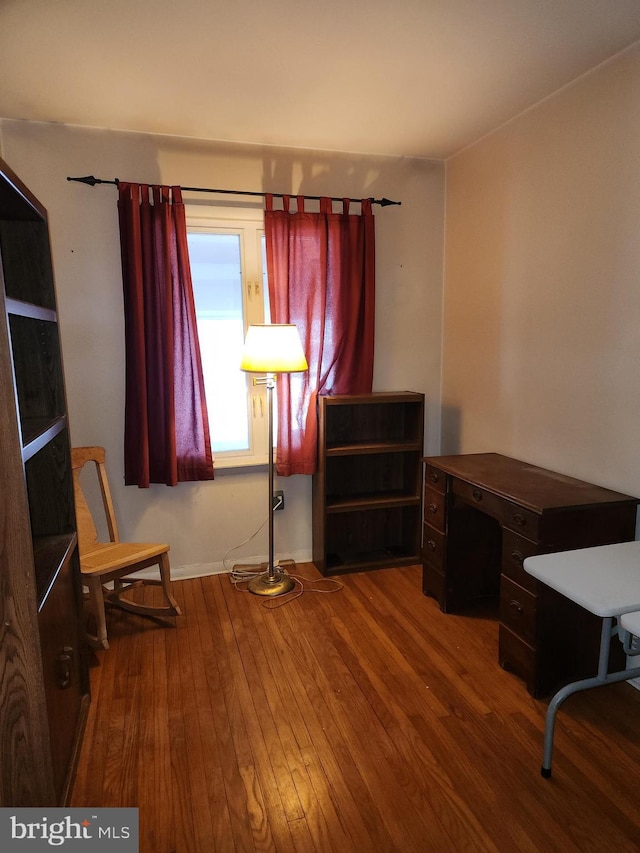 sitting room featuring hardwood / wood-style flooring