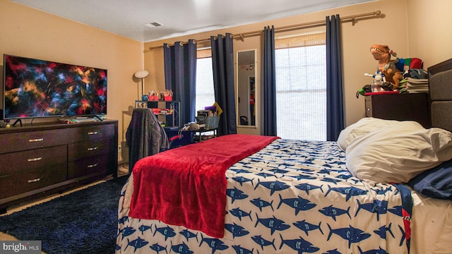 bedroom with visible vents