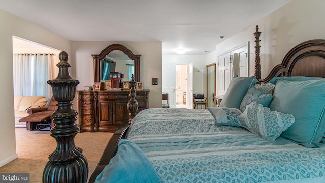 bedroom featuring carpet