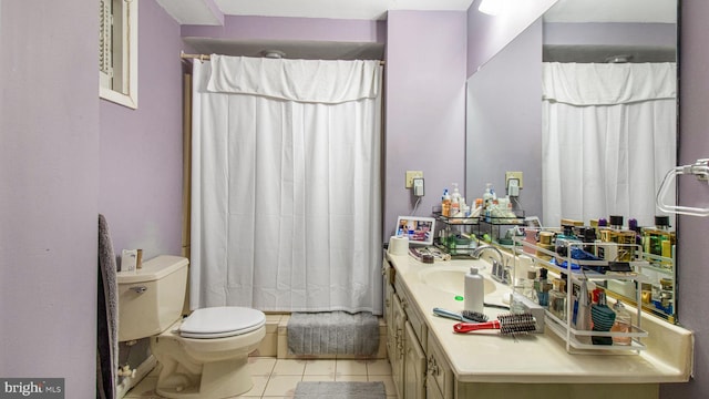 bathroom with tile patterned flooring, a shower with curtain, toilet, and vanity