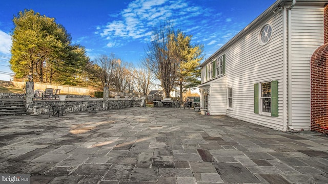 view of patio with fence