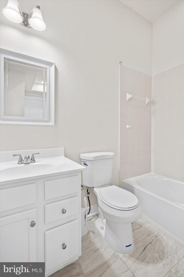 full bath with shower / washtub combination, vanity, and toilet