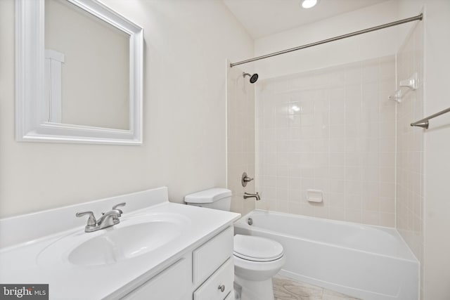 full bath with tub / shower combination, vanity, and toilet