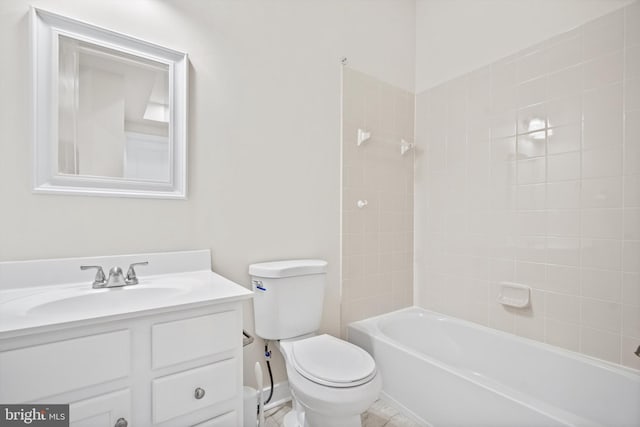 bathroom featuring toilet, shower / bath combination, and vanity