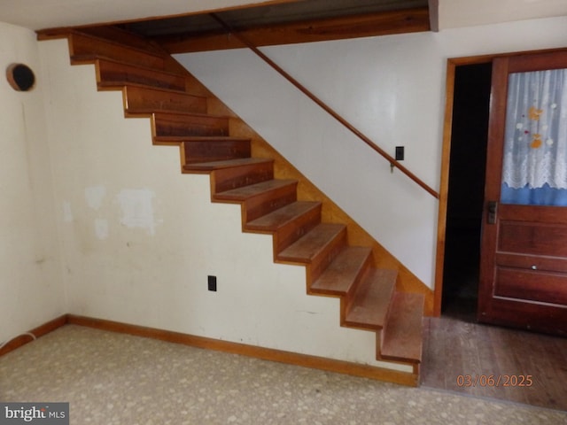 staircase with baseboards