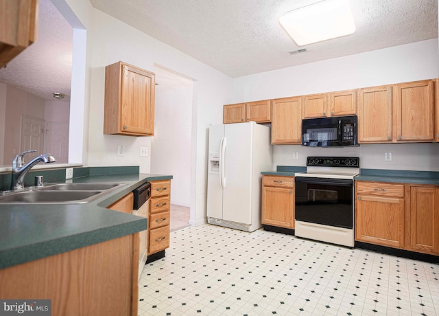 kitchen with light floors, range with electric stovetop, a sink, white fridge with ice dispenser, and black microwave