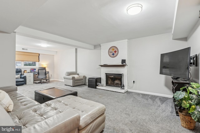 living room featuring carpet floors, a brick fireplace, and baseboards