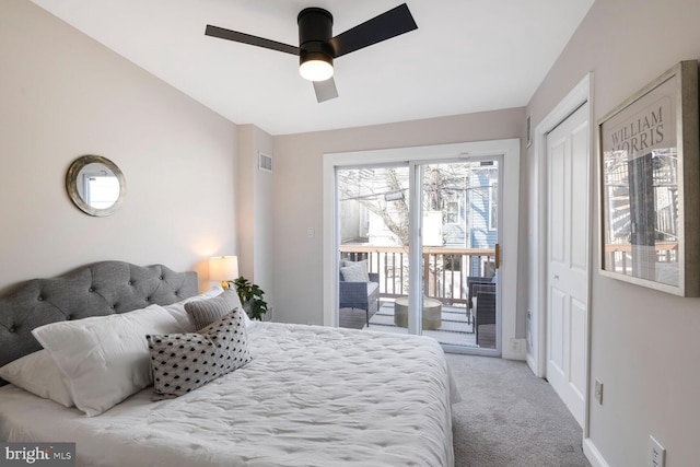 bedroom featuring baseboards, visible vents, a ceiling fan, access to outside, and carpet flooring