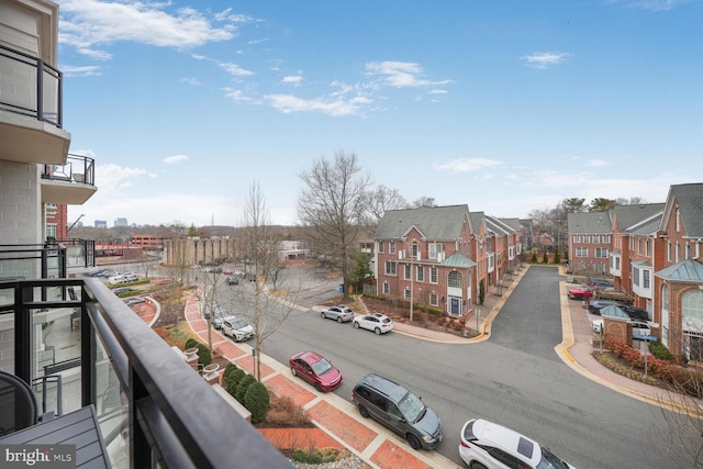 balcony featuring a residential view