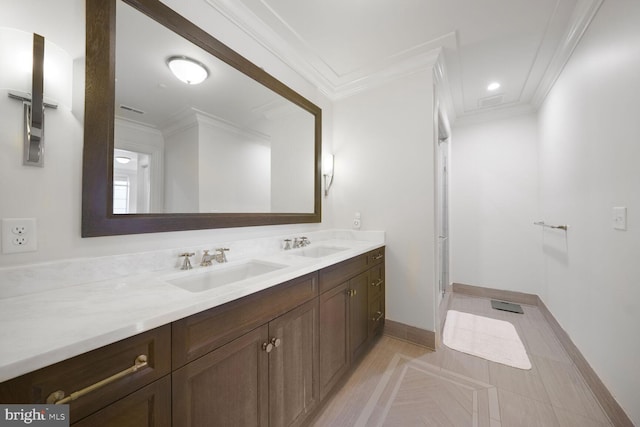 full bathroom with a sink and crown molding