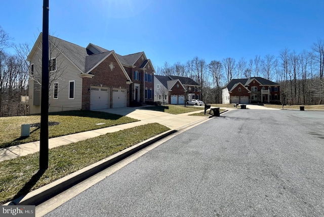 view of road featuring sidewalks, a residential view, and curbs