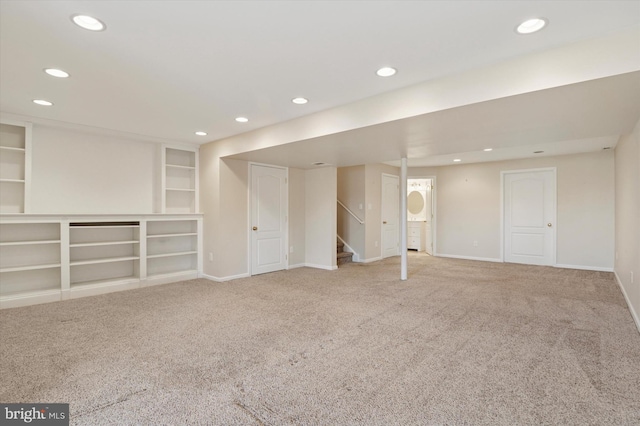 finished basement with recessed lighting, carpet flooring, stairway, and baseboards