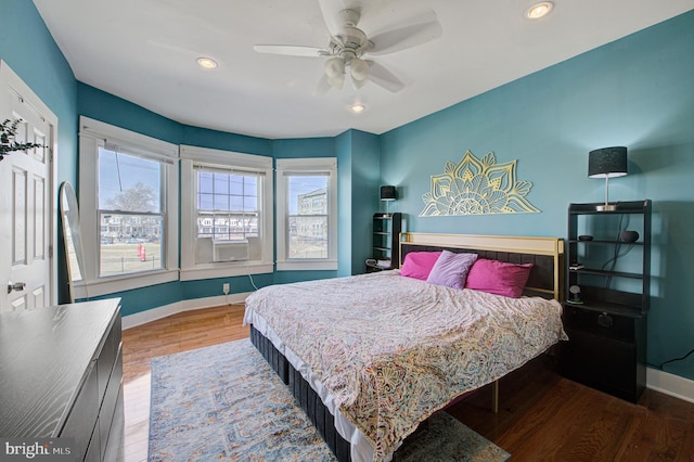 bedroom with ceiling fan, baseboards, wood finished floors, and recessed lighting