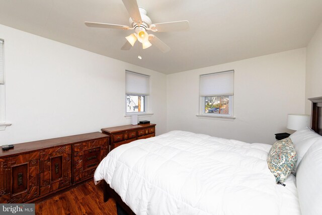 bedroom featuring ceiling fan and wood finished floors