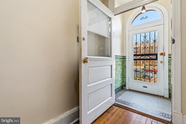 doorway featuring wood-type flooring