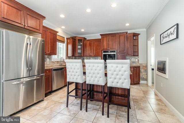 kitchen with glass insert cabinets, crown molding, baseboards, decorative backsplash, and stainless steel appliances